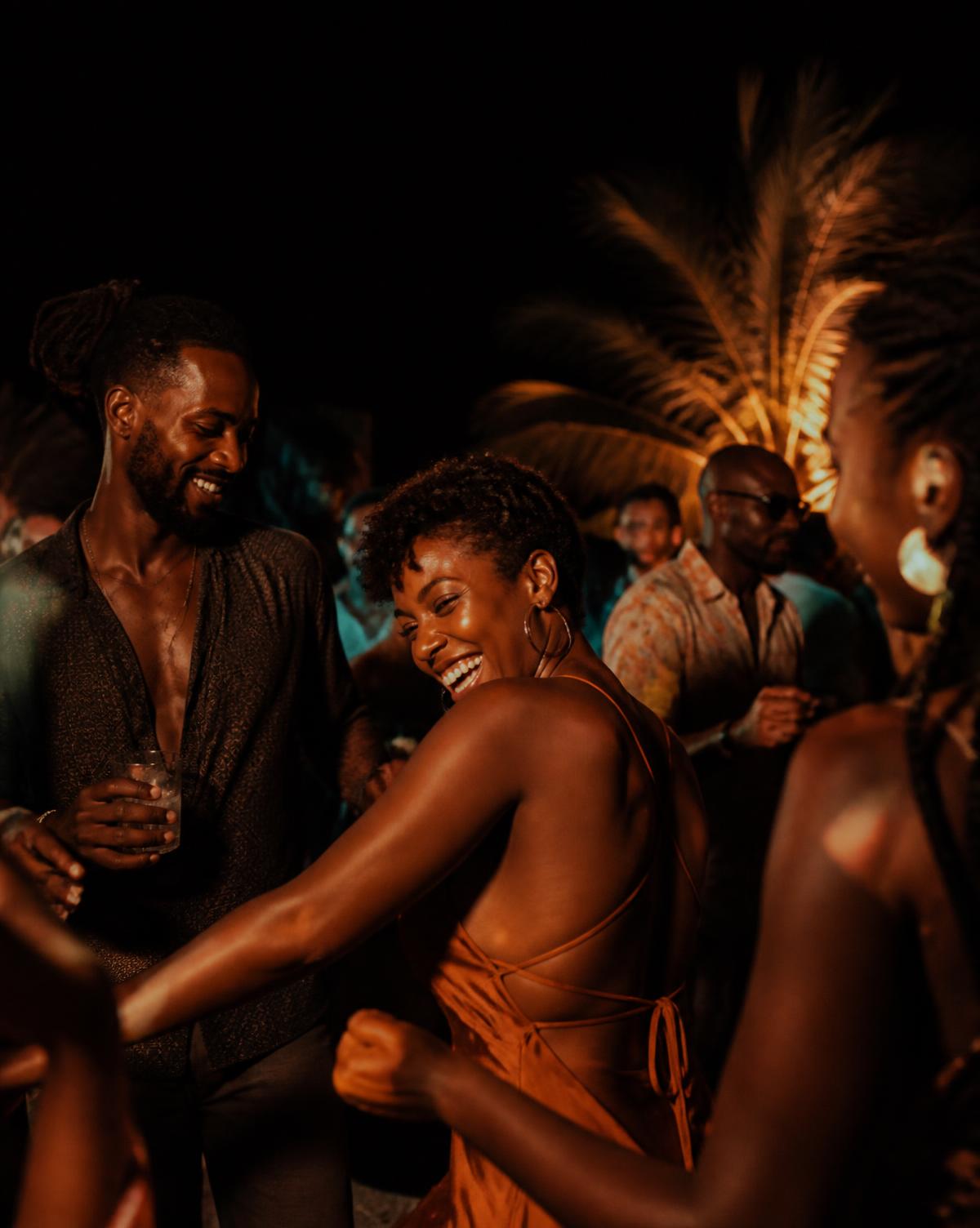 Guests dancing at an open-air night event